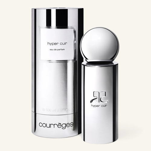 Courrèges Hyper Cuir perfume bottle with a tall chrome body and white label