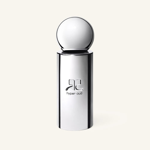Courrèges Hyper Oud perfume bottle featuring a round chrome cap and cylindrical body